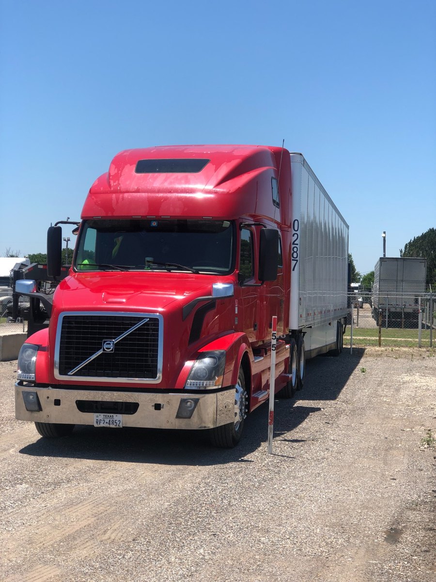 GATT Logistics red Volvo sleeper truck with dry van trailer